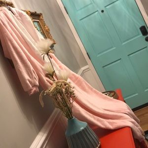 Onesie w/ dinosaur tail and spikes.